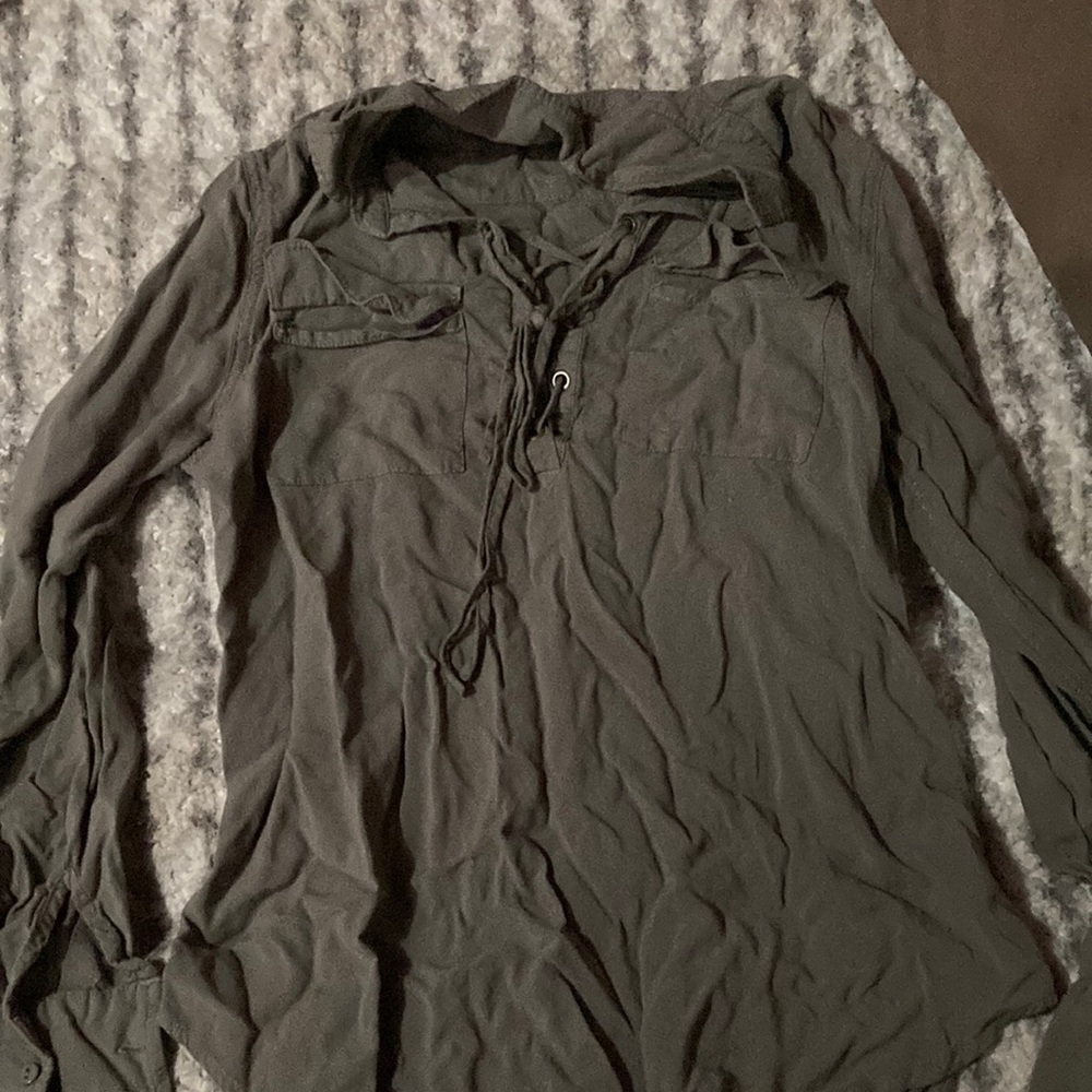 Shirt with strings in front